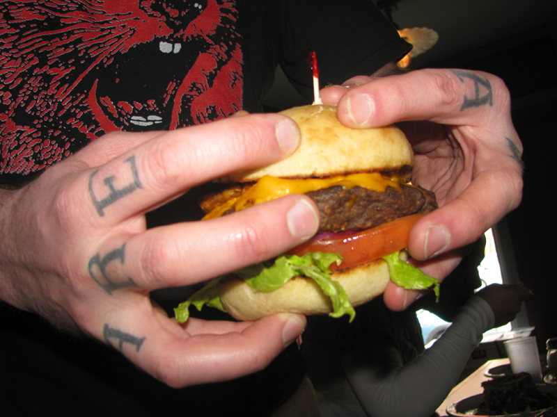 This burger may not look ridiculous - but it is. It's Wayward Vegan Cafe's VEGAN bacon cheeseburger which...is ridiculous.