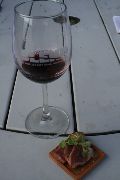 Chef Anderson's Beef Tataki: Seared with Salish herb garden basil, onion relish, yuzu-infused grapes, houses made ponzu, petite Asian greens and sesame dust.