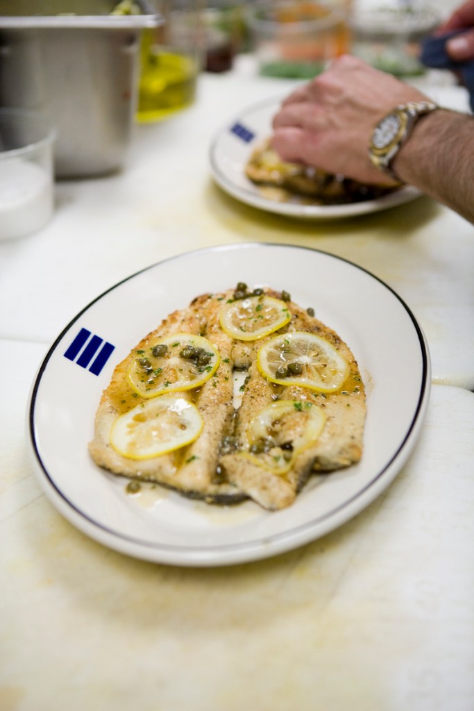 SautAced stream raised Rainbow trout with preserved lemons, parsley, capers, and brown butter.