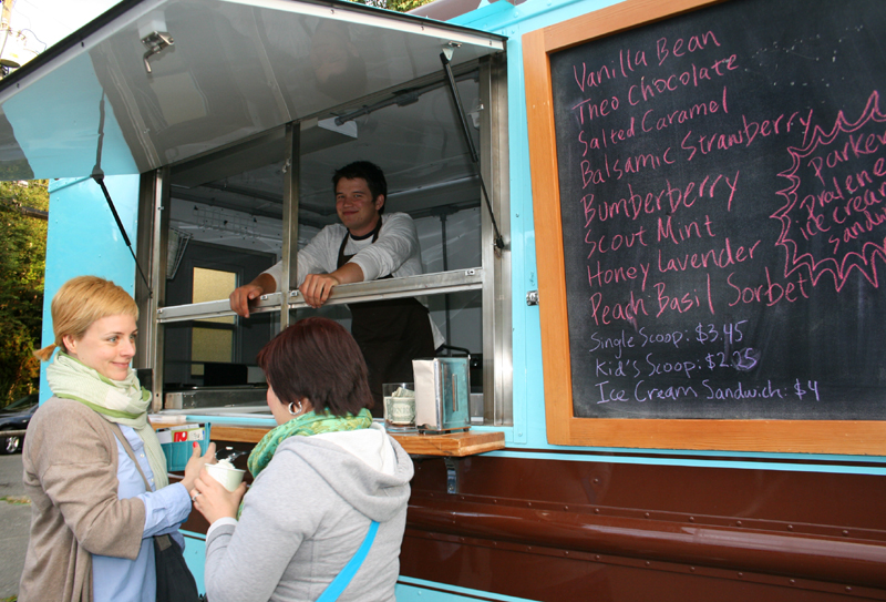 Scooping it out from the Molly Moon's truck.