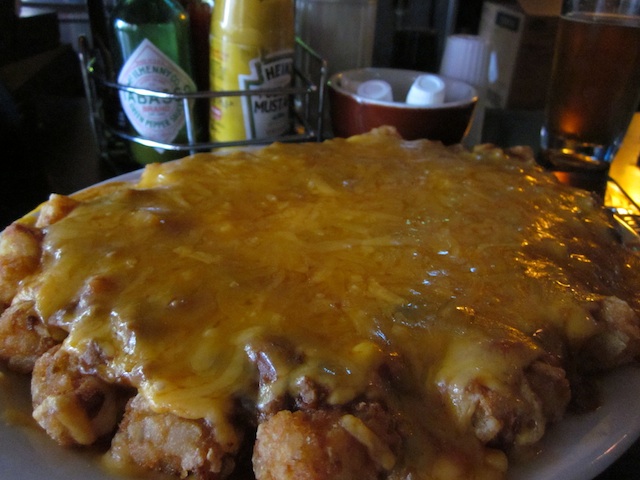 2. 5 Point, 415 Cedar St, 448-9993This is where you go to get sober food. You know, greasy burgers, omelets and of course, tots. You might not see them on the menu, but the 5 Point's got 'em, slathered with so much cheese and chili, you can barely see the actual tater tots. This enormous plate of sobering sustenance can't be beat. Add a little hot sauce and this is just about the best late-night snack you can get for $7.25. Hell, it's one of the best breakfasts or lunches you can get for that price.