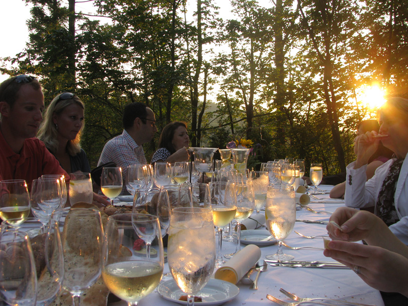 The sun begins to set as the festivities brighten.