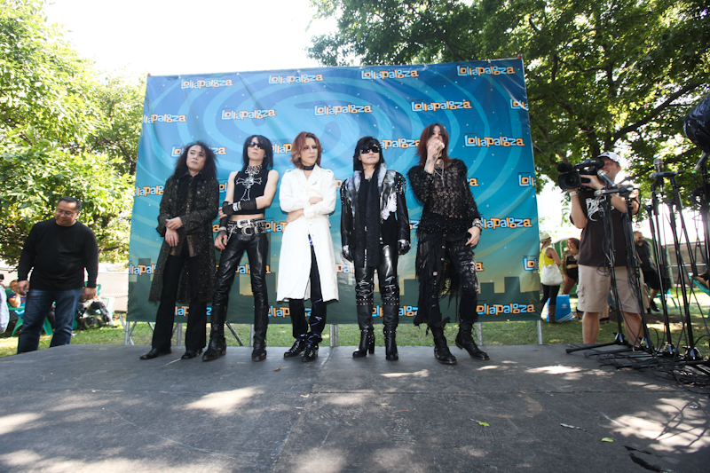 X Japan pose for a photo on Sunday.