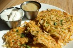 Potato latkes with sour cream and applesauce - of course.