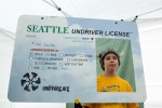 Cole Smith, 8, gets his "Undriving" License at the Green Festival in the Convention Center in Seattle, Wash., on Sunday, June 6, 2010.  (Photo by Matthew Williams for The Seattle Weekly)