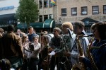 The Chief Sealth High School Marching Band warms up outside Easy Street.
