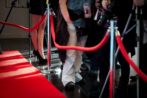 Reporters and photographers wait for actors, actresses and directors to walk the red carpet at the Seattle Independent Film Festival at Benaryoa Hall in Seattle, Wash., on Thursday, May 20, 2010.  (Photo by Matthew Williams for The Seattle Weekly)