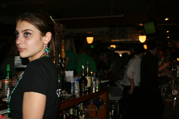 Suzy ponders how many more shots she's going to have to pour behind the bar at Kells tonight.