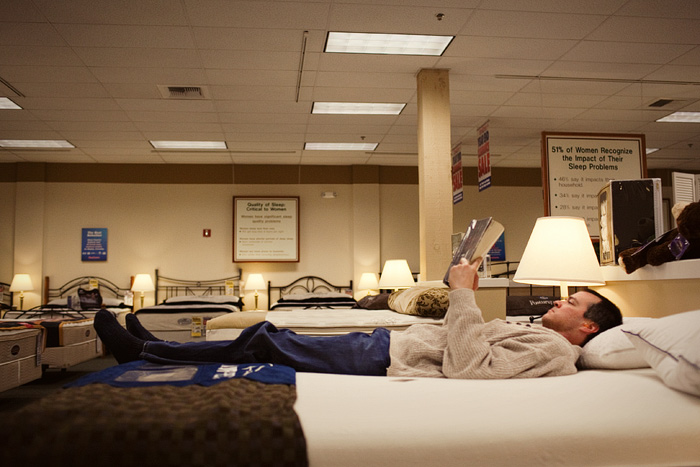 Testing out beds at Sleep Country.