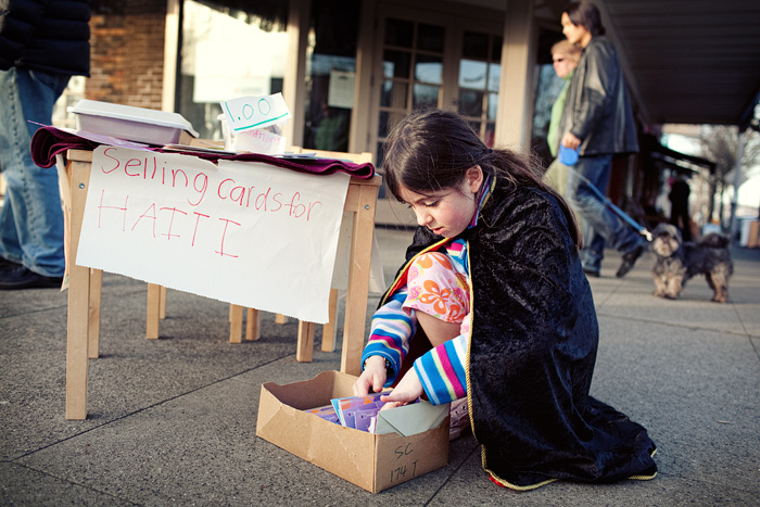 Sydney was out selling cards and chocolate chip banana bread brownies to raise money for Haiti's earthquake victims.