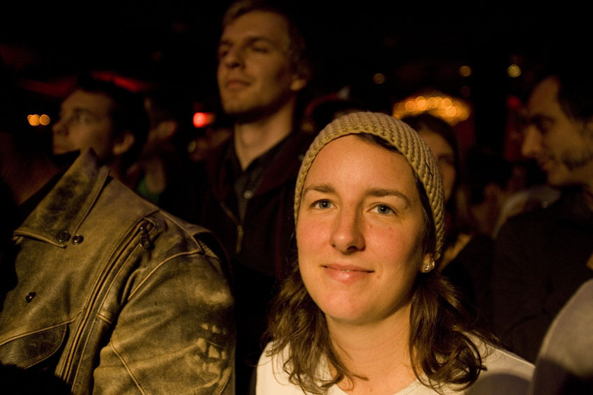 Ann Wolken is smiling because Doug Martch just walked on stage.