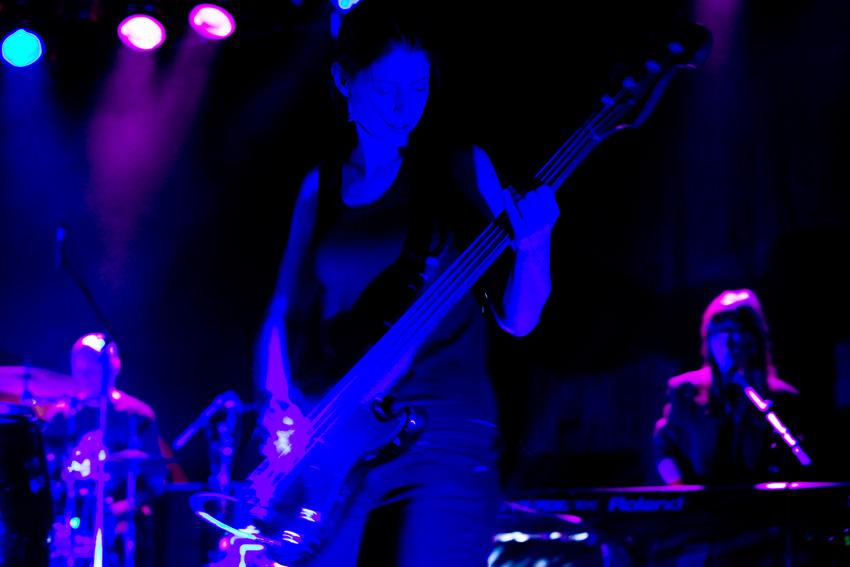 Bassist in blue.