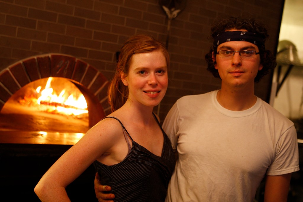 SEATTLE, WA FRIDAY OCT. 4, 2009 Delancey Pizza in Ballard Brandon Pettit unloads a pie from the wood burning oven at Delancey Pizza in Ballard. Pettit owns the restaurant with wife Molly Wizenberg. Photos by Kevin Casey/Seattle Weekly