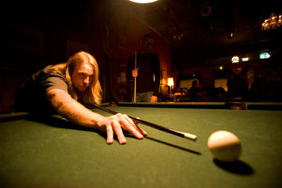 Rising Tides playing pool in Georgetown.