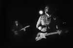 Death Cab for Cutie, Showbox, Seattle, WA, February 28, 2003: This was their first Seattle show with new drummer, Jason McGerr, and everyone was excited to see how their first tour with him would shake out. I remember spending part of their set that night behind Chris Walla's amp, catching moments where he seemed completely taken over by the music, eyes closed, head back, arm driving up and down his guitar. Everyone in the band has a very fluid style of playing.A  Each has a certain sway, or dance they naturally do while playing. Here, Ben powers through.