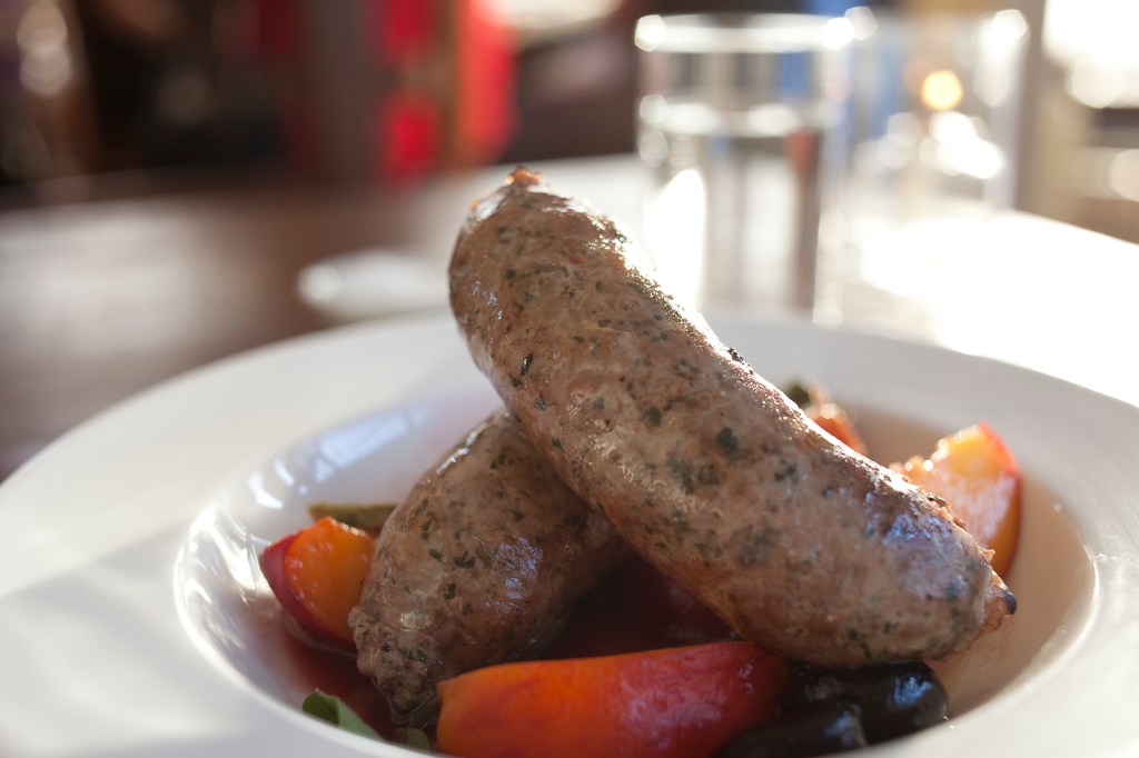 Two stubby links of lamb sausage, studded with hazelnuts and chopped sage, could have used a bump of pork fat to smooth over any graininess from the lean meat.