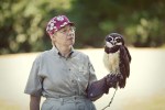 Catherine, a zoo volunteer, holds Coba, the 17 year old Spectacled Owl she handles every Friday.  Coba has been at the zoo since birth.