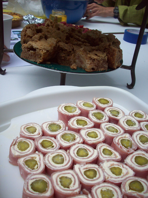 David Miller is a one-man church potluck, arriving with deli-ham rolled around cream cheese and pickles, apple cake, and gumbo.