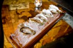 Their oysters--kushis, Olympias, shigokus, other top picks from the Northwest--are presented on a long, blocky rectangle formed from pressed ice cubes.