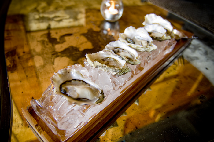 Their oysters--kushis, Olympias, shigokus, other top picks from the Northwest--are presented on a long, blocky rectangle formed from pressed ice cubes.