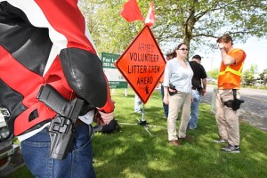 A group from OpenCarry.org pick up trash along their area along Interstate 5 Freeway near Fife as part of the Adopt-A-Highway program on Sunday, May 17, 2009. The group supports the right to carry a firearm . (Kevin P. Casey/Seattle Weekly)