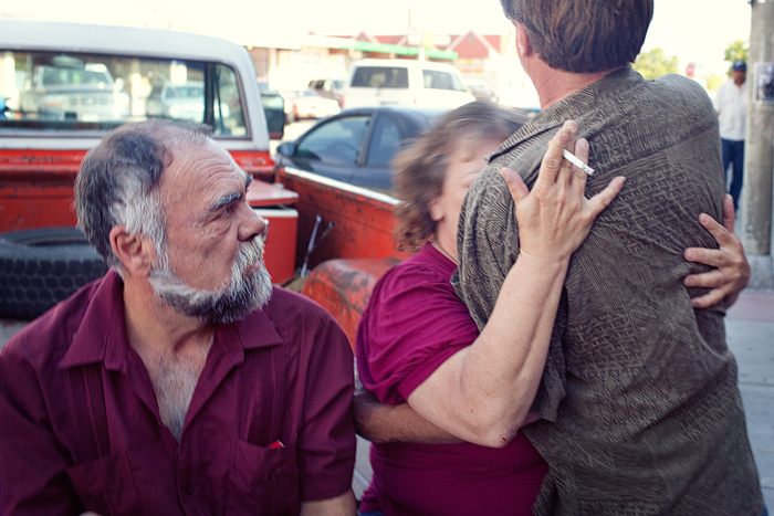 Juan tries to figure out who Eileen is embracing.