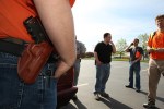 A group from OpenCarry.org pick up trash along their area along Interstate 5 Freeway near Fife as part of the Adopt-A-Highway program on Sunday, May 17, 2009. The group supports the right to carry a firearm . (Kevin P. Casey/Seattle Weekly)