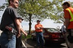 A group from OpenCarry.org pick up trash along their area along Interstate 5 Freeway near Fife as part of the Adopt-A-Highway program on Sunday, May 17, 2009. The group supports the right to carry a firearm . (Kevin P. Casey/Seattle Weekly)