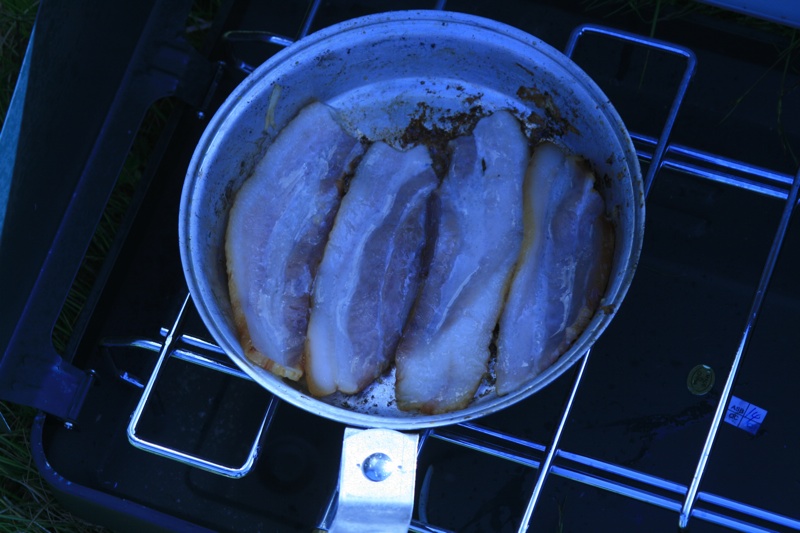 You'll want a good breakfast before your day begins, and here's what I suggest. Cook some bacon on your campstove first and leave the grease in the pan after it's done.