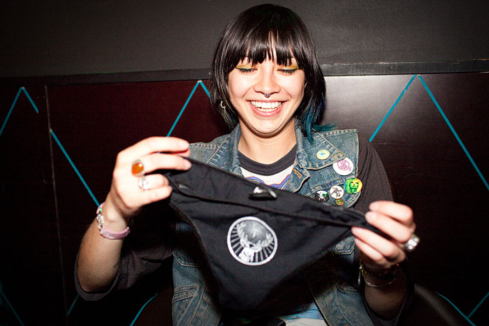 Naomi checks out the Jagermeister thong that she ended up going home with after placing eighth.