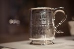 Engraved silver mug: Joseph Ledell, Sr Engraver (showing biblical tale of Joseph).