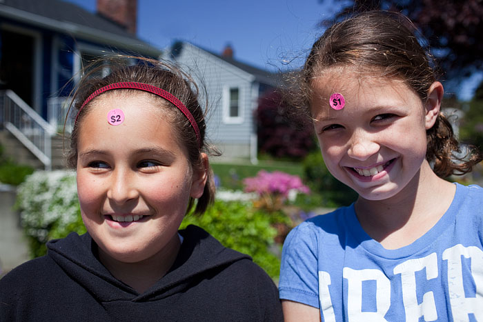 Sarah and Jordyn have been up since 8 a.m. selling refreshments and toys.