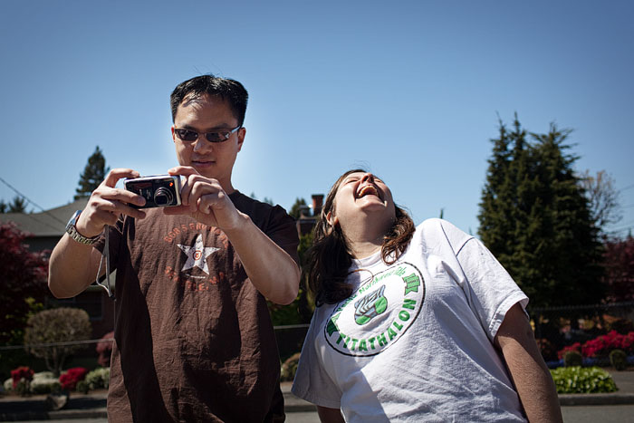 Summer with her guy, taking photos of the ugly chairs for posterity.