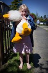 Natalie hugs her new stuffed duckie.