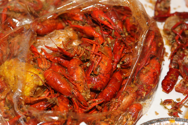 Crawfish served by the pound with corn at Crawfish King in Seattle on Sunday May 3, 2009. (Kevin P. Casey/Seattle Weekly)