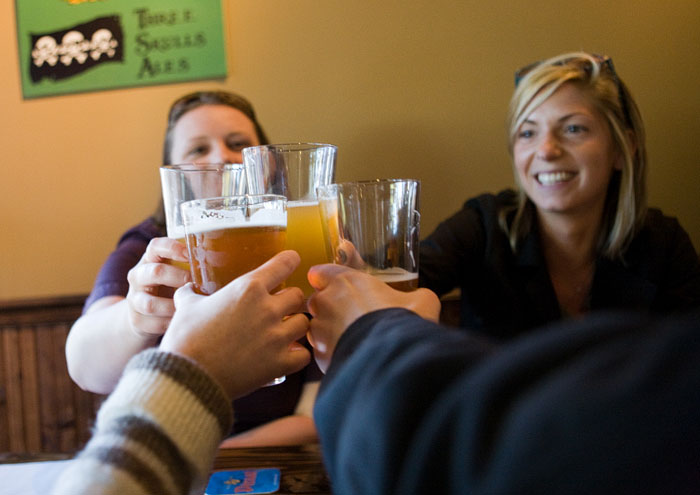 Brette, Nicole, Emily & Sean toast to completing another hard day of work at The Pillager's Pub.