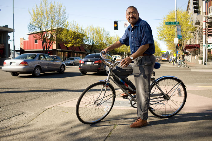 Manuel bikes home after work.