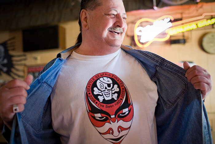 A regular shows off his Seafair Pirate 2009 Landing shirt.