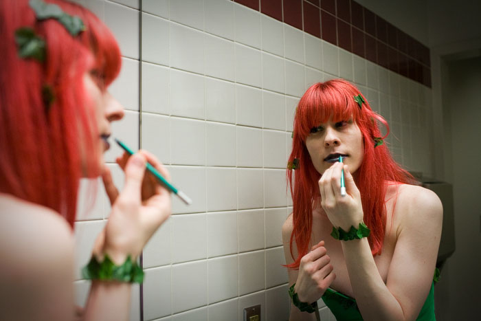 Joanie puts the final touches on her Poison Ivy costume.