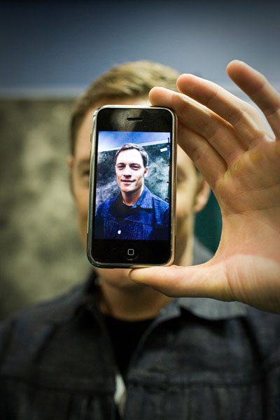Battlestar Galactica hottie Tahmoh Penikett and his iPhone.