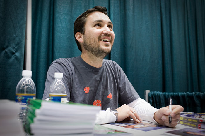 Will Wheaton signing a Stand By Me photo for some fans.