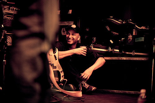 Tom Morello watches the rest of Steve Earle's set.
