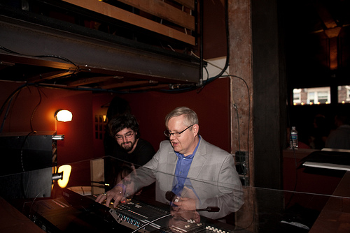 The dapper Jim Anderson attended to the sound.