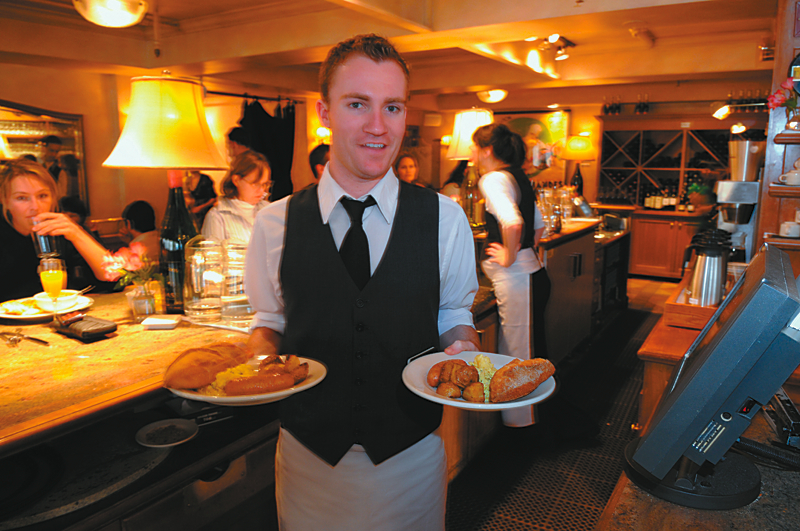 Cafe Campagne: Cafe Campagne is devoted to French bistro cooking the way Amy Winehouse is devoted to eyeliner: visibly, avidly, with shades of the ridiculous. The entry door is labeled aEœtirezaE (pull), and there are Beaux Arts-style posters on the walls. Yet the cafe is more than a studious recreation of a Parisian resto. ItaE™s a warm, echt Seattle restaurant that holds its own, in the romance department, against nearby Il Bistro and Chez SheaaE”the Gary Cooper and Carey Grant of SeattleaE™s restaurant scene. The rustic food that Campagne chef Daisley Gordon serves the downstairs clientele sometimes shows off his mastery of classic technique better than the more artful plates upstairs: in the crackle and burnish of the skin on a duck leg confit, say, or the delicate balance of vinegar, shallot, and bitter chicories in his goat-cheese salad. And Cafe CampagneaE™s hanger steak, which comes with a garlicky Roquefort butter, silky sauteed escarole, and one of MonetaE™s haystacks recreated in fried potatoes, is still the cityaE™s best. Note by JONATHAN KAUFFMAN; Serves: lunch, dinner, weekend brunch. 1600 Post Alley, 728-2233, PIKE PLACE MARKET. campagnerestaurant.com/cafe_home.html