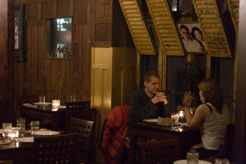 May Thai: Intimate and pricier than a majority of its peers, May ThaiaE™s two-story teak house is elaborately decorated in bronze and mahogany wood. Inside the dimly lit dining area, servers almost wordlessly go about their duties and patrons converse quietly with their heads close together. Even the most casual noodle fare is served in an artistic manner. The pad thai is tucked inside a banana leaf and mixed at your table, according to your spice and herb preferences. The curries are fiery and full of tender meat (try the duck), basil, and bamboo. The deep fried sweet corn with tamarind sauce is intended to be an appetizer, but could just as easily pass as a dessert. You donaE™t want to grab a quick lunch at May Thai. You want to luxuriate there for a few hours in the evening. ItaE™s ideal for a date. So much so, that my sources tell me that the man who accompanied me took another girl there just a week later. I commend his choice of location, even if he is a bastard. Note by ERIKA HOBART, Serves: lunch, dinner. 1612 N. 45th St., 675-0037, WALLINGFORD.