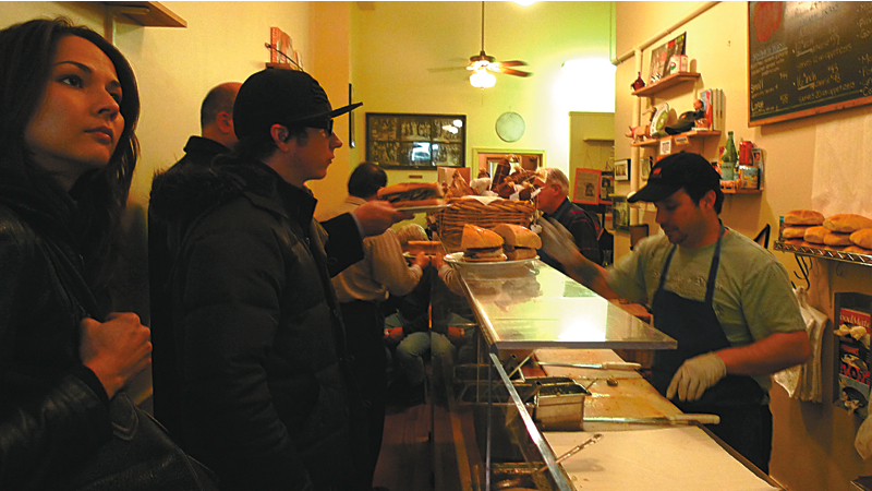 Salumi: Here's how not to eat at Salumi: aEœHey, neighbor, it's noon and Friday, you wanna walk over to Batali's and grab a sammy?aE You'll end up at the end of a snaking line toward King Street with an empty stomach and envy in your eyes. Last winter I witnessed a longer lime out the Salumi door than the nearby Union Gospel Mission. I was so hungry, frustrated, and down on my (relative) luck that I nearly hit up the latter. So, here's what to do if you want a bite of Seattle's best artisan sandwich: Show up at 10:30 a.m. (30 minutes before opening) on a Wednesday. Bring the new issue of Seattle Weekly, and wait. You're gonna wait no matter what, so you may as well do it knowing that all the menu options will still be available when you reach the front of the line. (A highly dubious proposition later in the day.) Of course you could also wait until thereaE™s a freak snow storm and the streets are covered in ice, stroll down to find the restaurant all to yourself, and not bring any food back for the rest of the office. (IaE™m looking at you, boss.) Note by CHRIS KORNELIS; Serves: lunch. 309 Third Ave. S., 621-8772, DOWNTOWN, salumicuredmeats.com