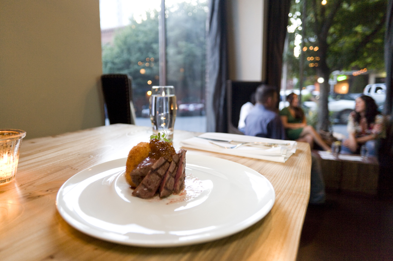 Spur: At their tiny cocktail bar-restaurant, decorated in a style you might call West Elm Western, Dana Tough and Brian McCracken have rightly picked up a reputation for being among SeattleaE™s most adventurous chefs. Given their work with molecular-gastronomy devices, I imagine their kitchen as a cross between the Flubber set and a high-priced hair salon. But most of the unsuspecting diners on whom the pair bestows their gels, foams, and creams will only notice how good everything tastes. ThataE™s because, in terms of flavors, McCracken and Tough are echt Seattle, calling on the best of the seasonal, local produce within their reach. The two both trained under Maria Hines, whose all-organic restaurant, Tilth (see below), is a model for sustainable, ingredient-driven cuisine. Their playfulness comes out in texture: a parmesan foam floating over a plate of fresh tagliatelle with hedgehog mushrooms and a duck egg yolk; the sashimi-like feel of a chunk of smoked salmon croustade with mascarpone and pickled shallots. This is food that your retired parents, as well as your Top Chef-addicted college student, will fall for. Note by JONATHAN KAUFFMAN; Serves: dinner, late night. 113 Blanchard St., 728-6706. BELLTOWN, spurseattle.com