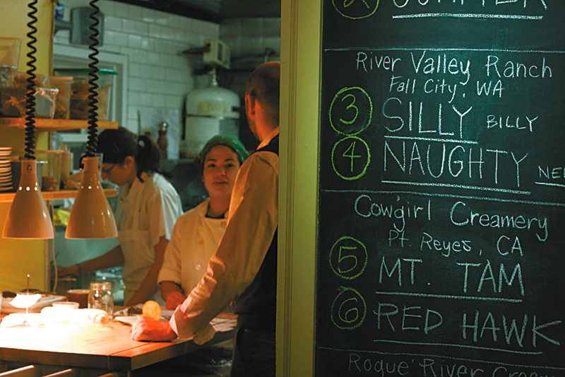 Tilth: When Maria Hines first opened Tilth, the food was goodaE”the duck burgers with fingerling chips damn goodaE”but you could sense the strain the four-star chef felt cooking organic on a tight budget. Two years on, sheaE™s upped the prices on her dishes by a few bucks (all still available in small and large portions), and her creativity has taken flight. A truffled cauliflower flan with bits of Meyer lemon and fried capers is as unctuous as a French triple-crA¨me cheese, and a sablefish fillet cooked sous-vide has the texture of a poached marshmallow. (Hines also uses this high-tech cooking method to amplify the flavor the braised fennel with which she anoints the fish.) HinesaE™ servers can muster all the polish of a much pricier restaurant without dumping the friendliness befitting a restaurant housed in a tiny Craftsman. And her version of choucroute garnieaE”braised sauerkraut, velvety pork cheek, and a breaded patty made of the meat picked off a pork trotteraE”is the best pork dish IaE™ve tasted in the Year of Bacon Overkill. Note by JONATHAN KAUFFMAN; Serves: dinner. 1411 N. 45th St., 633-0801, WALLINGFORD, tilthblog.wordpress.com