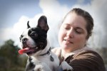 Waylon (after Waylon Jennings) is a Boston Terrier. Here with owner Emily.