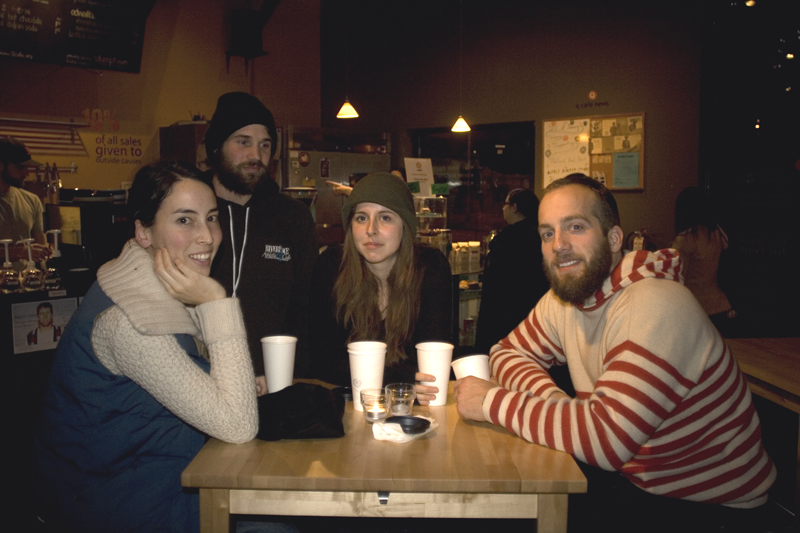 Enjoying the music, live painting and a warm cup of joe.